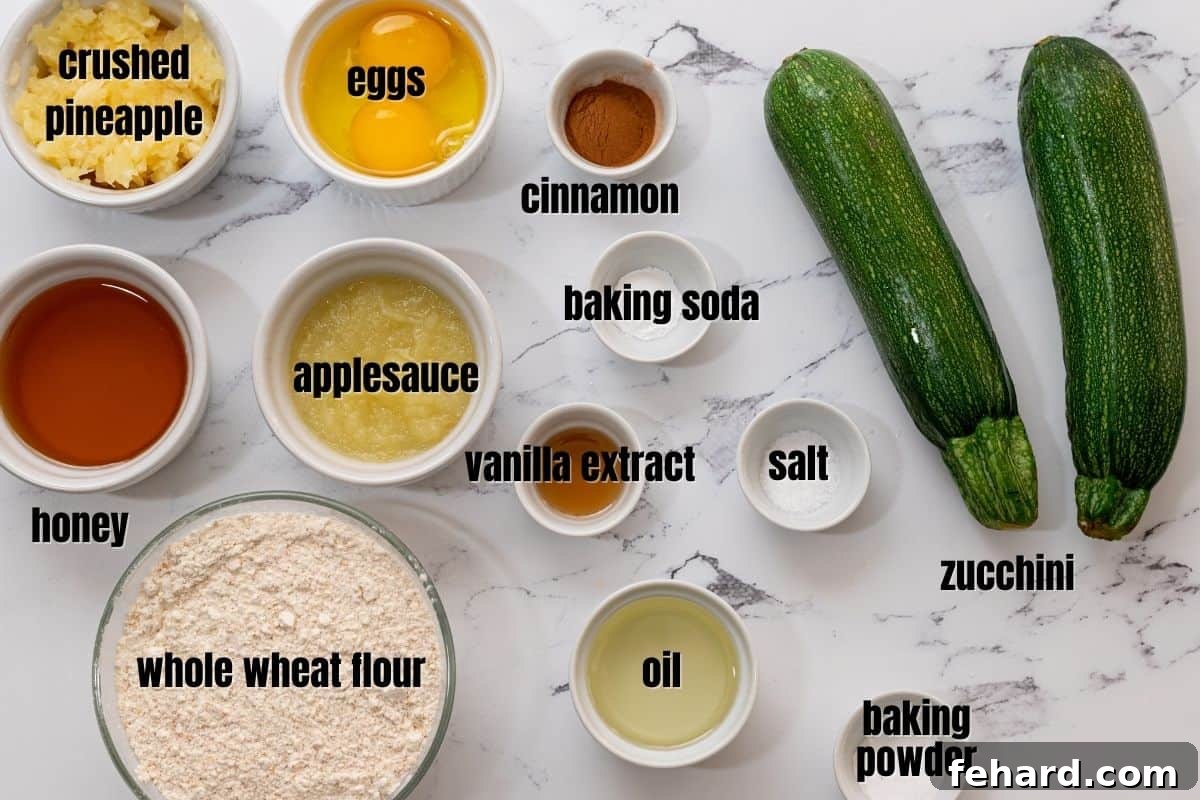 A vibrant flat lay of fresh zucchini, a can of crushed pineapple, a bottle of honey, a bag of whole wheat flour, and other baking essentials laid out for making healthy zucchini bread.