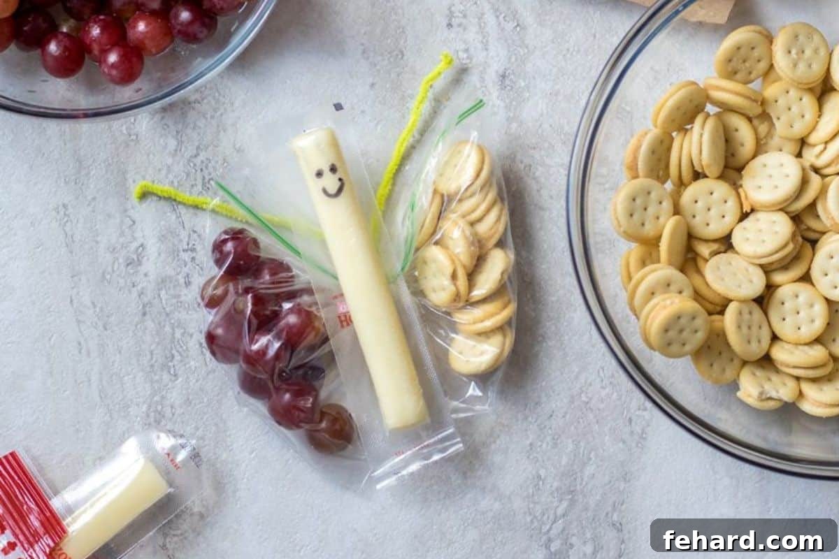 Snack Bag filled with mini crackers, grapes, and a cheese stick to look like Butterfly.