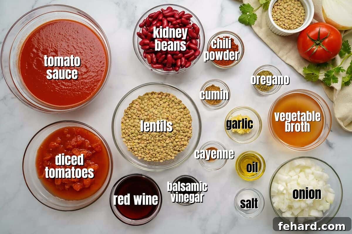 All the fresh ingredients for Instant Pot Lentil Chili laid out on a kitchen counter, clearly labeled.