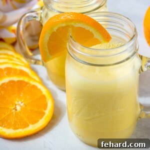 Easy Homemade Orange Julius in a glass, ready to be enjoyed.