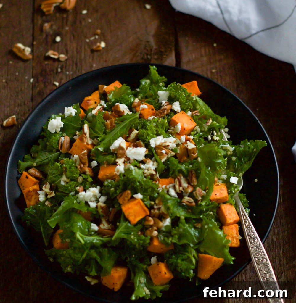 Close-up of a delicious Roasted Sweet Potato Kale Salad, showcasing ingredients.