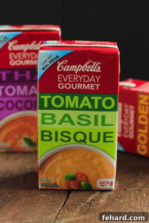 A comforting bowl of Campbell's Everyday Gourmet Tomato Basil Bisque, ready to enjoy as a quick and flavorful lunch or dinner.