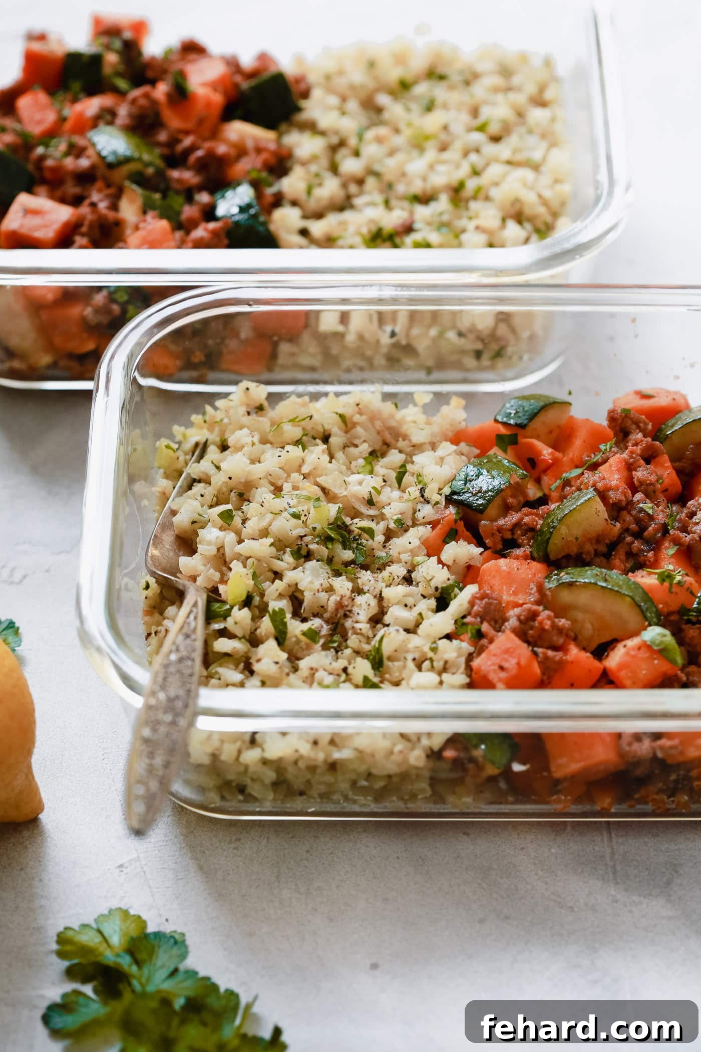 Smart Meal Prep: Ground Beef, Zucchini & Sweet Potato Skillet 4 Three glass meal prep containers filled with Ground Beef Zucchini Sweet Potato Skillet, perfectly portioned for the week's healthy meals.
