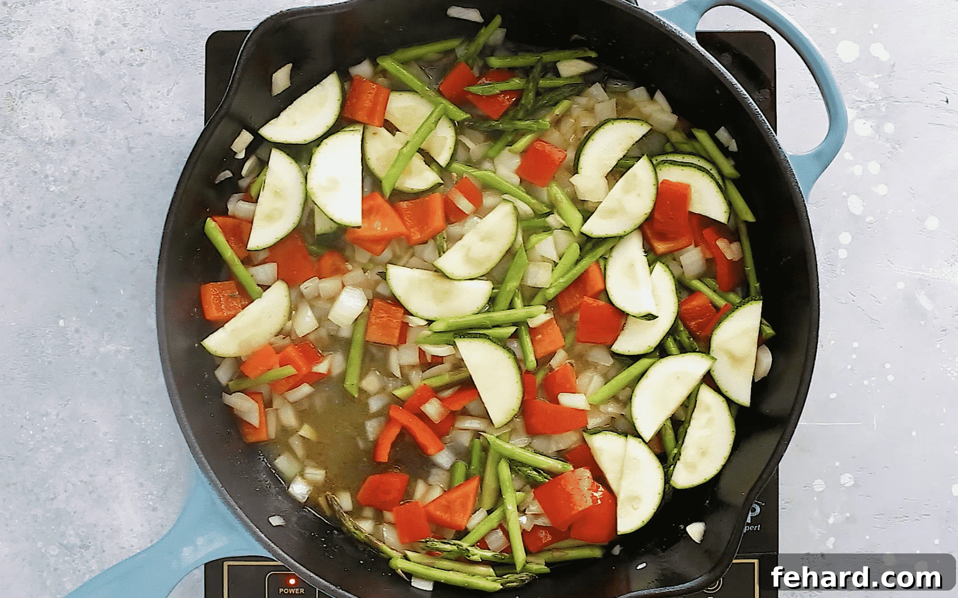 overhead view of veggies inside of a cast iron skillet