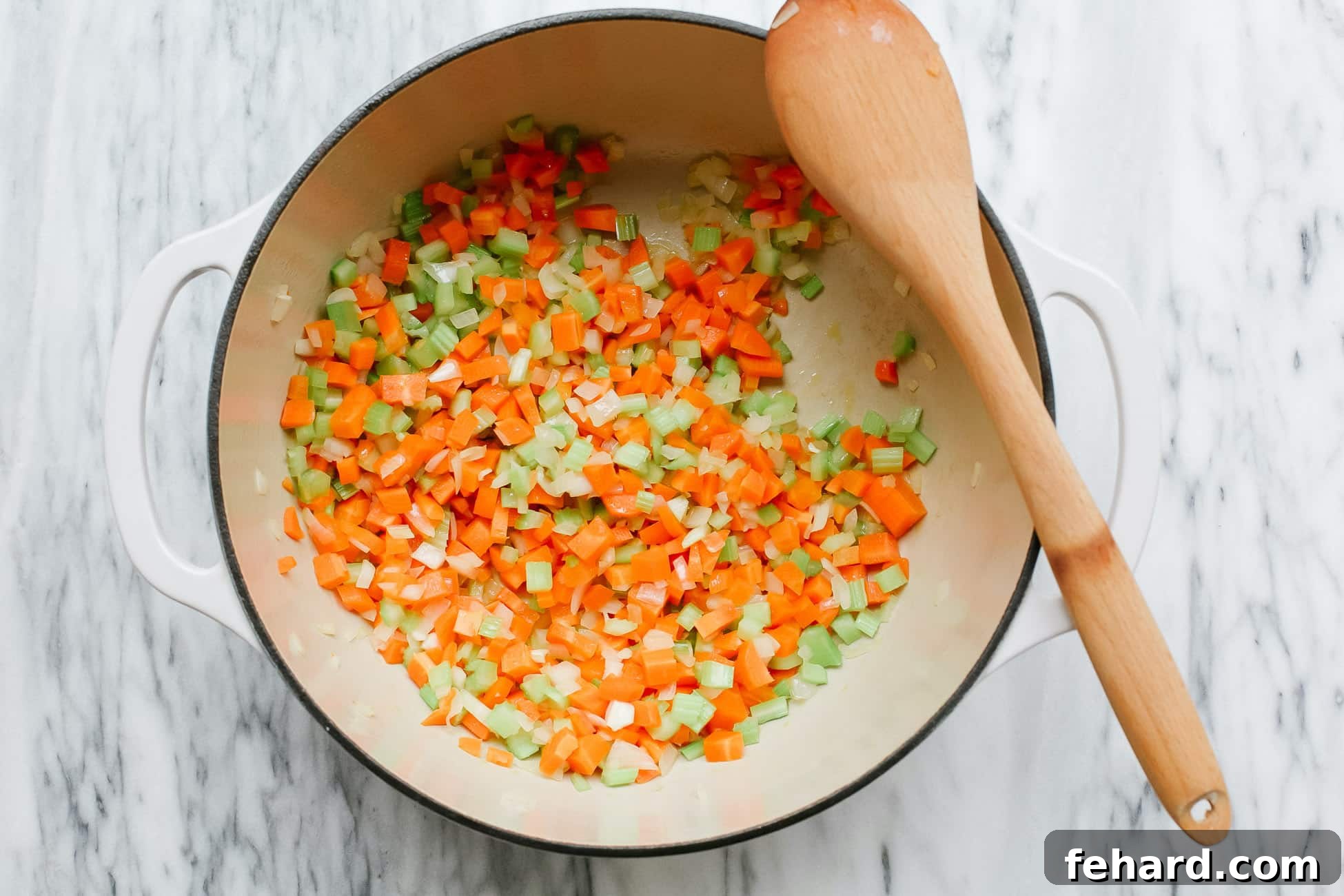 Vegetables sauted in a pot.
