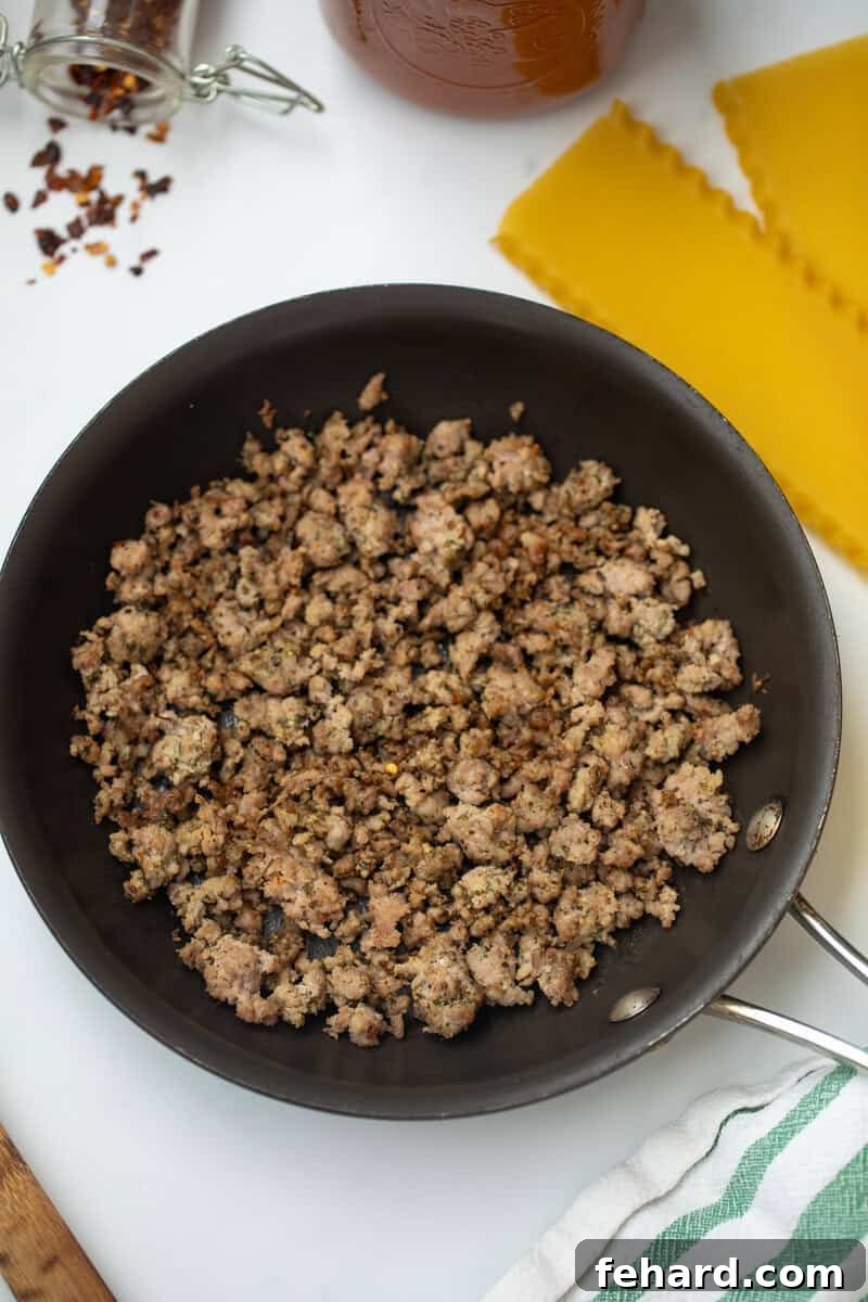 Easy Homemade Italian Sausage Recipe Homemade Italian Sausage browned in a nonstick skillet, ready for any dish.