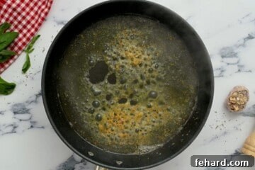 Proposal-Worthy Chicken 6 Saute pan with garlic, seasonings, and chicken stock.
