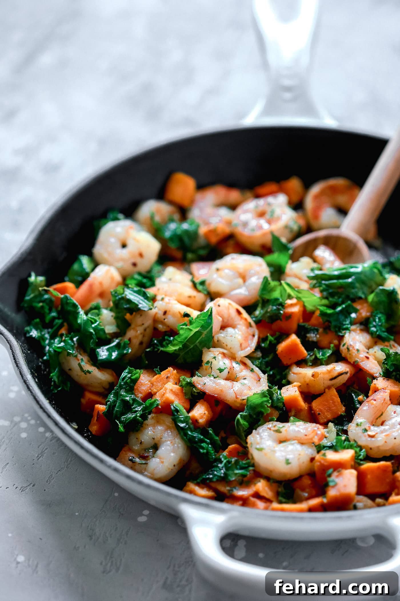 Vibrant Sweet Potato, Kale and Shrimp Skillet, ready to be served