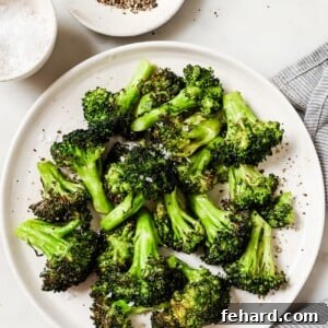 Quick & Crispy Air Fryer Broccoli 7 Air Fryer Broccoli, close-up shot of cooked broccoli