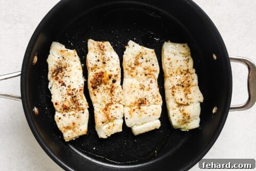 Pan-Seared Garlic Butter Haddock 12 Garlic Butter Haddock in a skillet