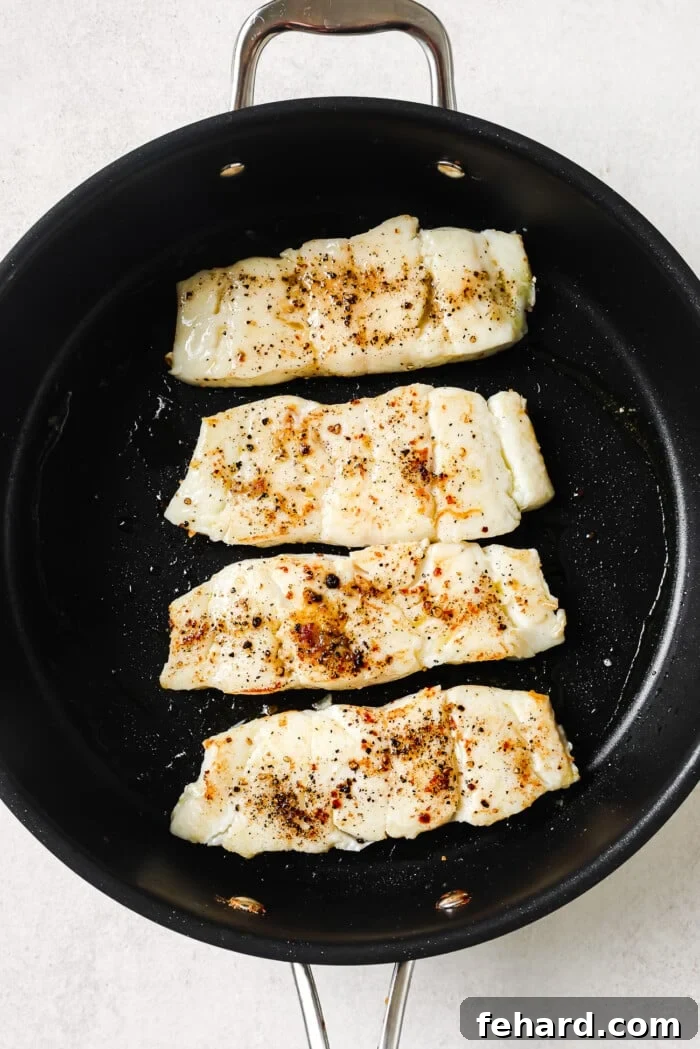 Pan-Seared Garlic Butter Haddock 6 Garlic Butter Haddock in a skillet