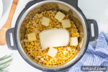 Instant Pot filled with ingredients for Creamed Corn before pressure cooking.