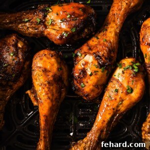Air Fryer Chicken Legs on a white plate