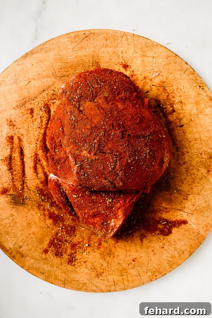Melt-in-Your-Mouth Slow Cooker Pulled Pork 4 A pork shoulder coated in a dry spice mixture.
