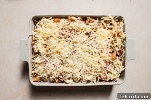 baked ziti in a white casserole
