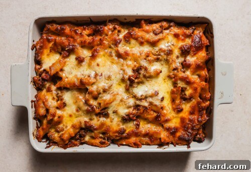 baked ziti in a white casserole