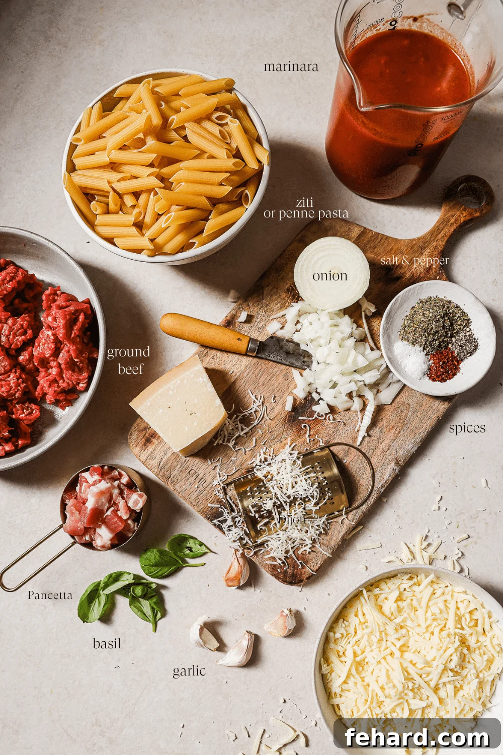 Prepped ingredients in small bowls on a wooden cutting board. 