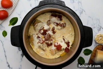 Instant Pot Chicken That Wins Hearts 4 Cooked Instant Pot Marry Me Chicken inside the inner pot after pressure release.