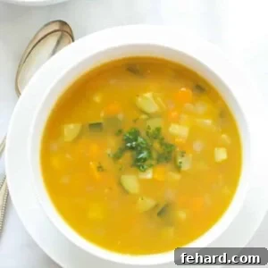 Summer Soup with peas, carrots and zucchini