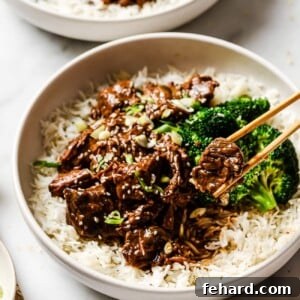 A close-up of the finished Slow Cooker Korean Beef, ready to be served over rice.