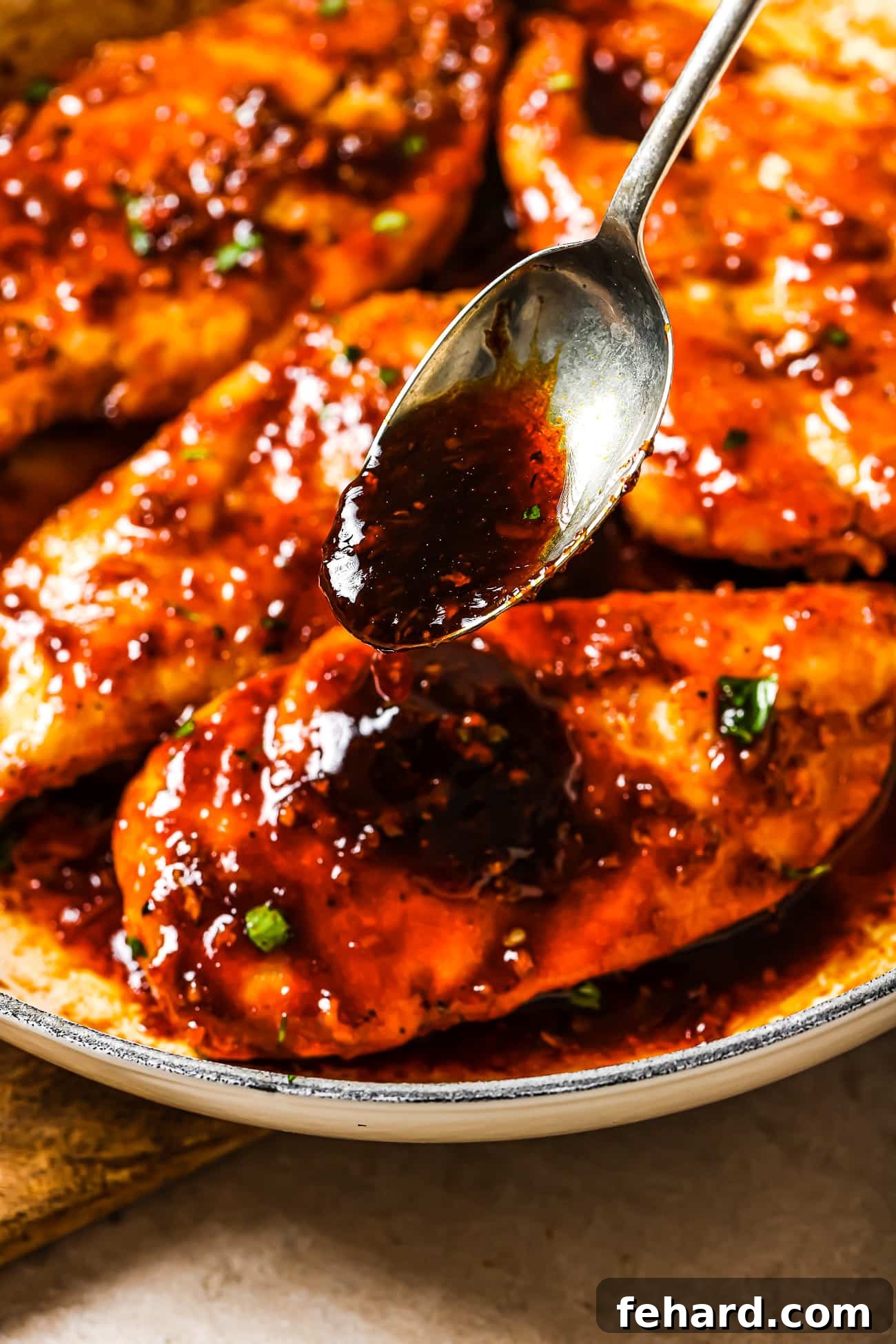 Sticky Honey Garlic Chicken Breast 10 Golden-brown chicken cutlets generously drizzled with sticky honey garlic sauce, artfully arranged and ready for a delightful meal.