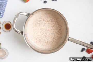 Tapioca pearls in small saucepan after softening in cream and milk.