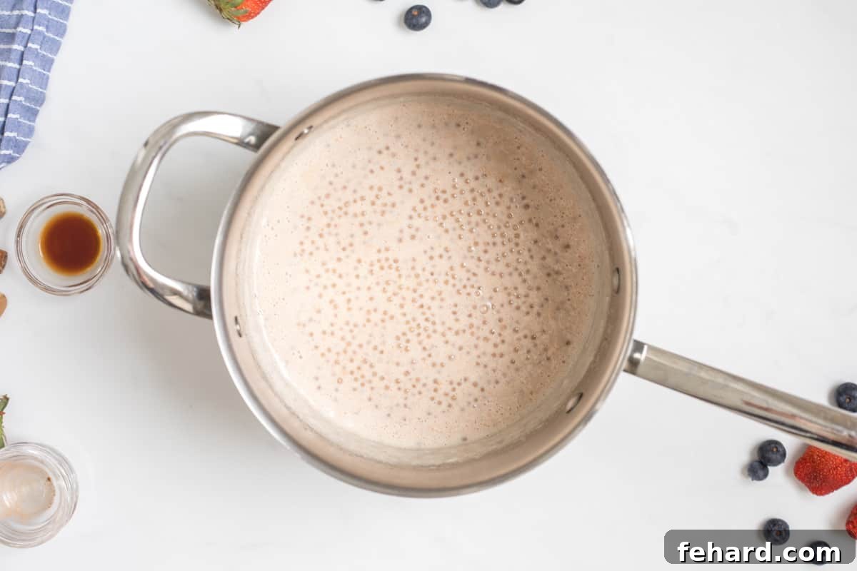 Recipe for tapioca pudding Tapioca pearls in small saucepan after softening in cream and milk.
