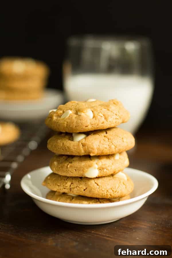Peanut Butter Chocolate White Chip Cookies on a plate, featuring their unique texture and melted white chocolate.
