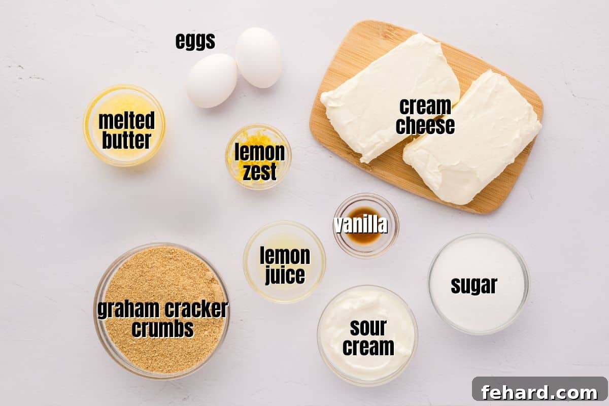 Recipe Lemon Cream Cheese Bars Ingredients for lemon cheesecake bars labeled on counter.