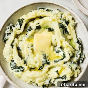 Colcannon Recipe in a bowl, with a pat of butter melting in the center.