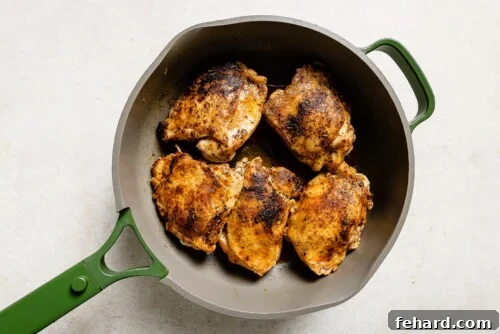 chicken thighs in a skillet