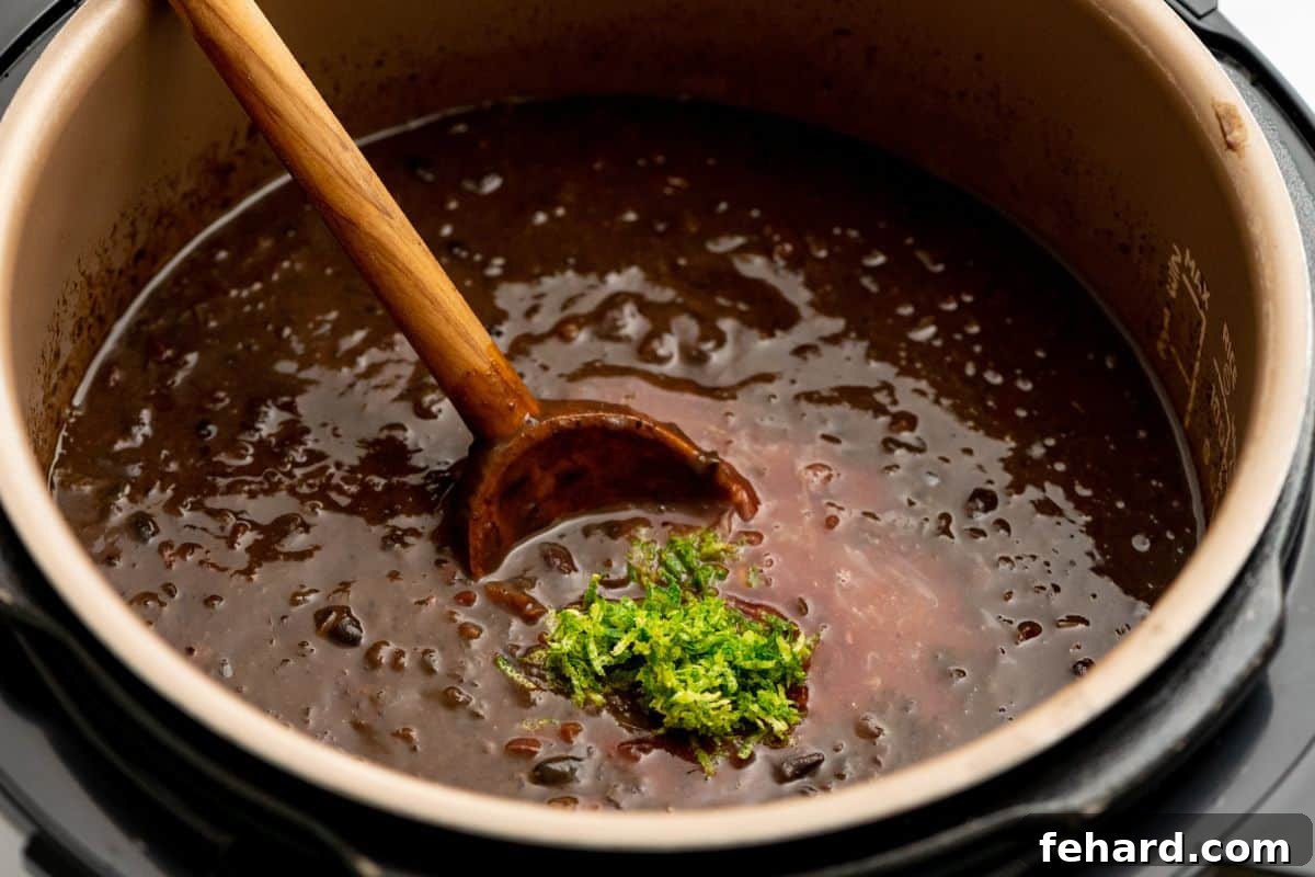 Easy Black Bean Soup Recipe Pressure Cooked Black Bean Soup with lime zest and lime juice in Instant Pot.