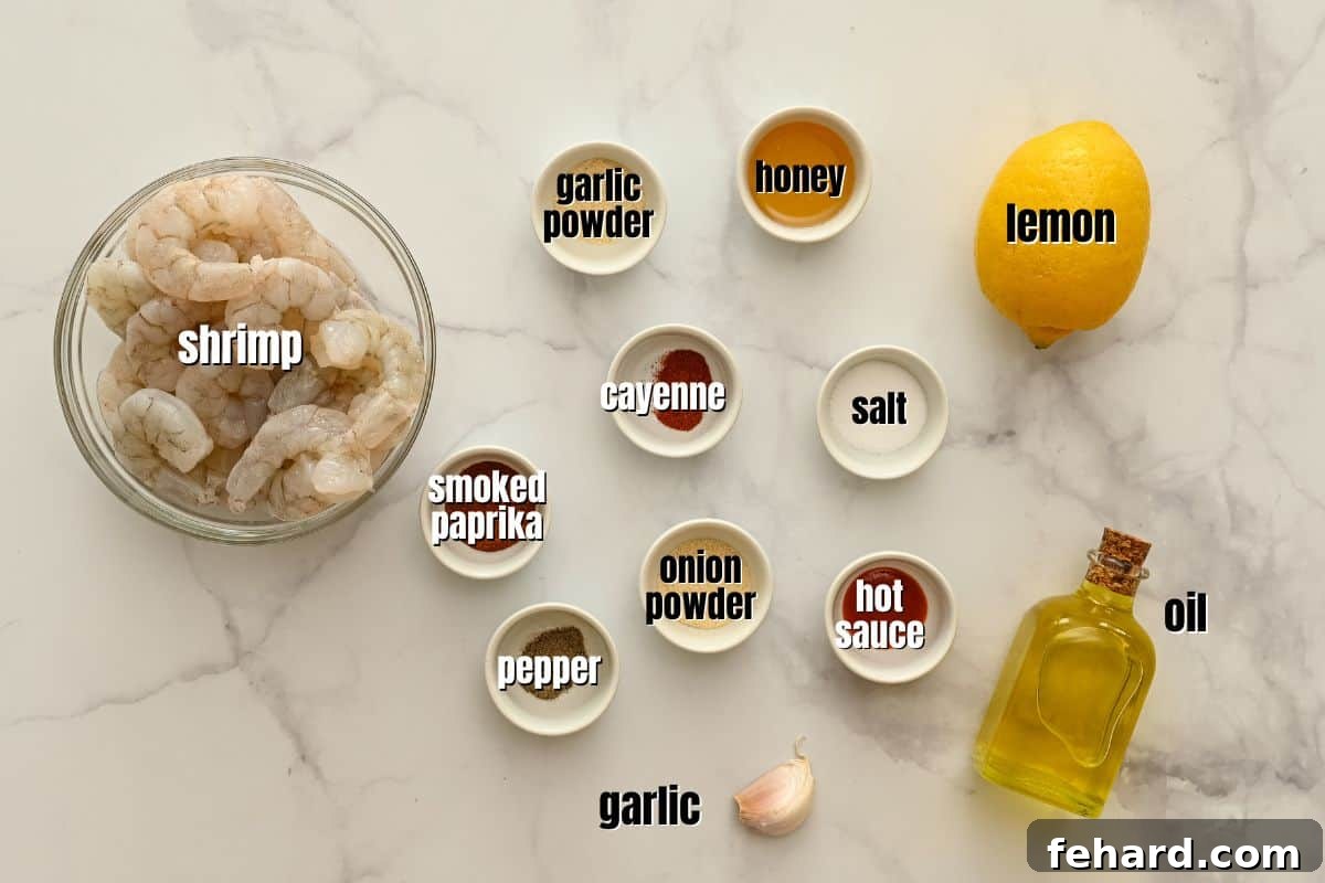Fresh ingredients for the Air Fryer Shrimp recipe meticulously laid out on a kitchen counter: raw shrimp, a whole lemon, garlic cloves, golden honey, olive oil, and a selection of aromatic spices.
