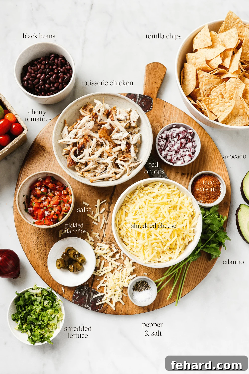 Pre-measured ingredients for rotisserie chicken nachos with text overlay on each component. 