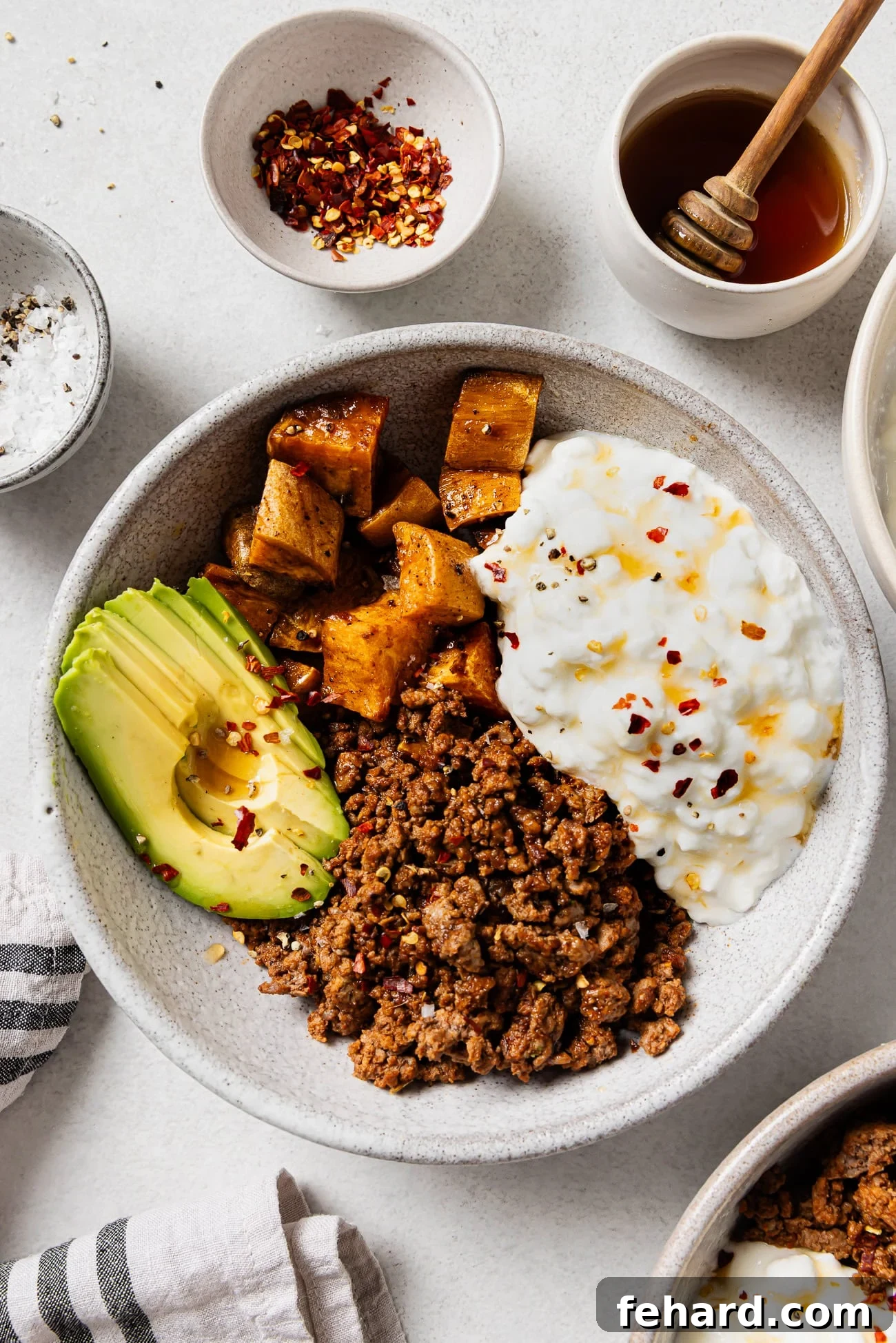 overhead view of cottage cheese taco bowls on a grey bowl. 