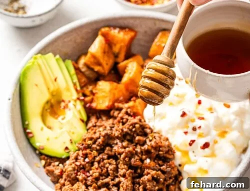 closeup view of cottage cheese taco bowl with hot honey.