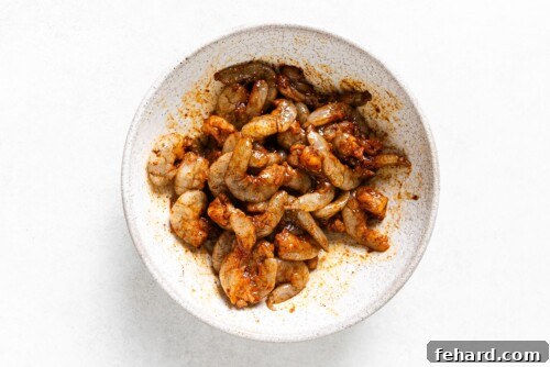 seasoned raw shrimp in a bowl