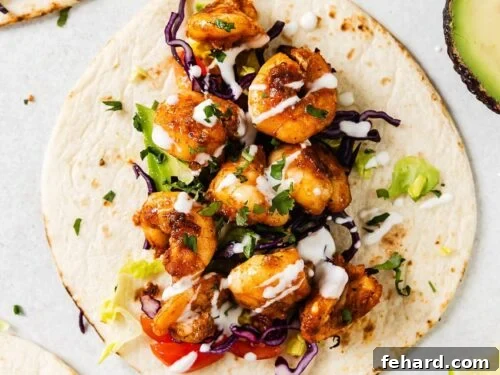 overhead view of shrimp tacos on a countertop