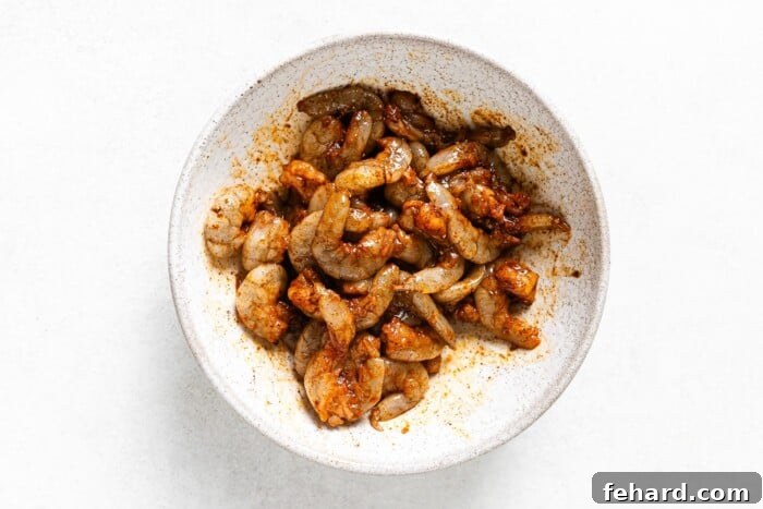 Baja Shrimp Fiesta 4 seasoned raw shrimp in a bowl