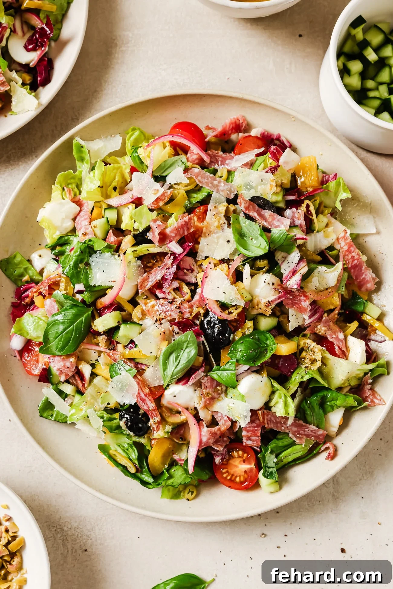 Vibrant Italian Chopped Salad 2 A beautifully arranged Italian chopped salad in a large white serving bowl, ready to be enjoyed.