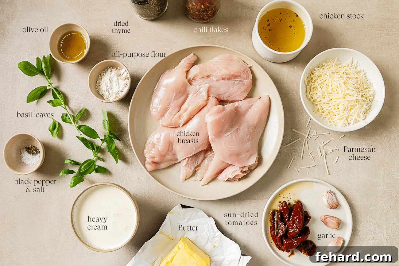 All the pre-measured ingredients for Marry Me Chicken, including chicken breasts, garlic, sun-dried tomatoes, cream, and spices, neatly arranged on a white kitchen countertop.
