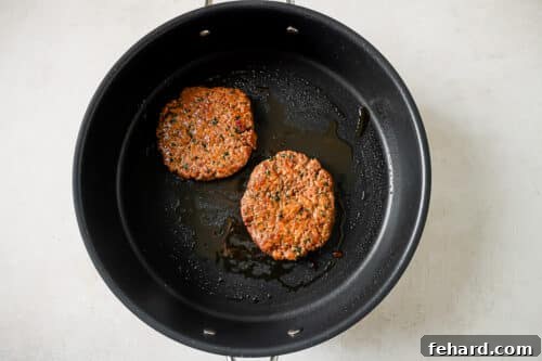 burger patties in a skillet