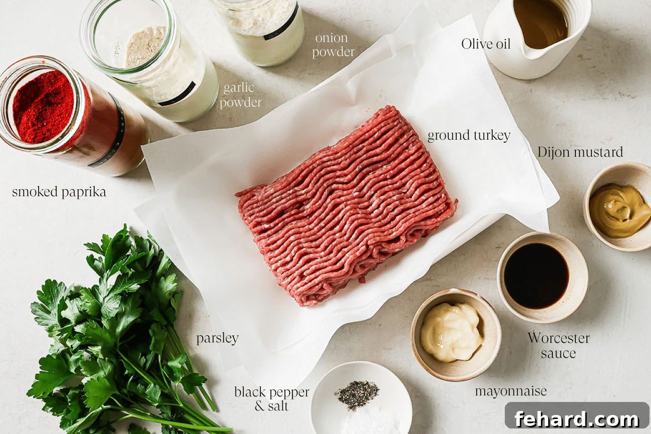Healthy and Hearty Turkey Burger 3 An overhead view of pre-measured and labeled ingredients on a white countertop.