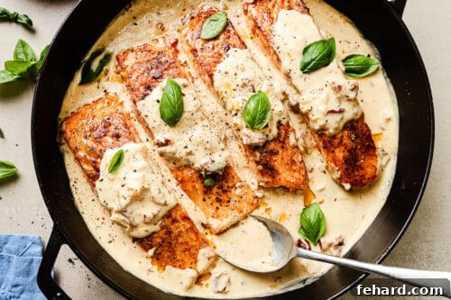 Marry Me Salmon garnished with fresh basil, ready to serve.