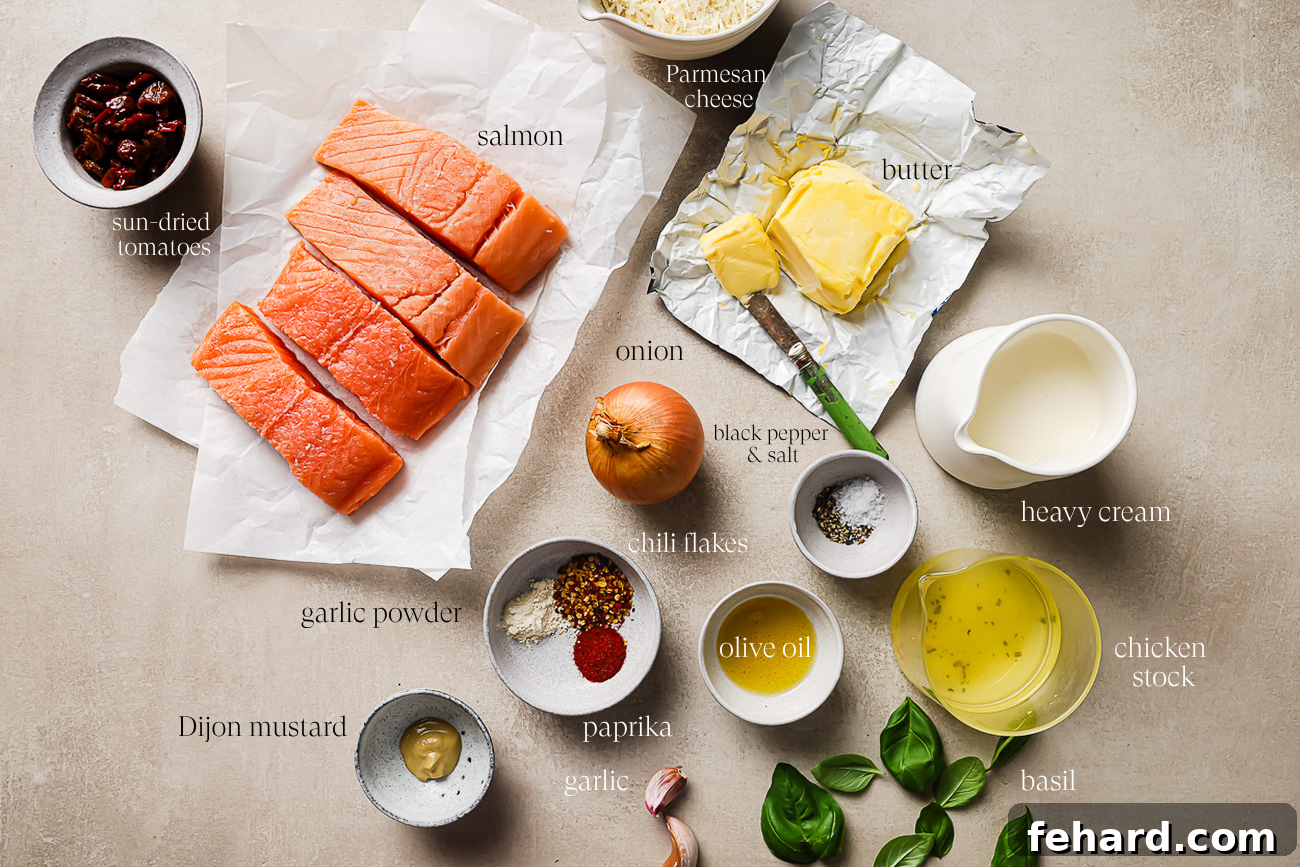 A vibrant display of fresh ingredients for Marry Me Salmon, including salmon fillets, garlic, sun-dried tomatoes, and basil on a kitchen countertop.