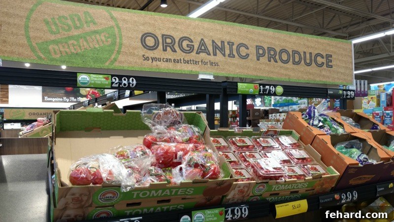 Aldi 10 Best Buys 4 ALDI Organic Produce display in store, showcasing fresh, colorful fruits and vegetables, highlighting the quality and variety available.