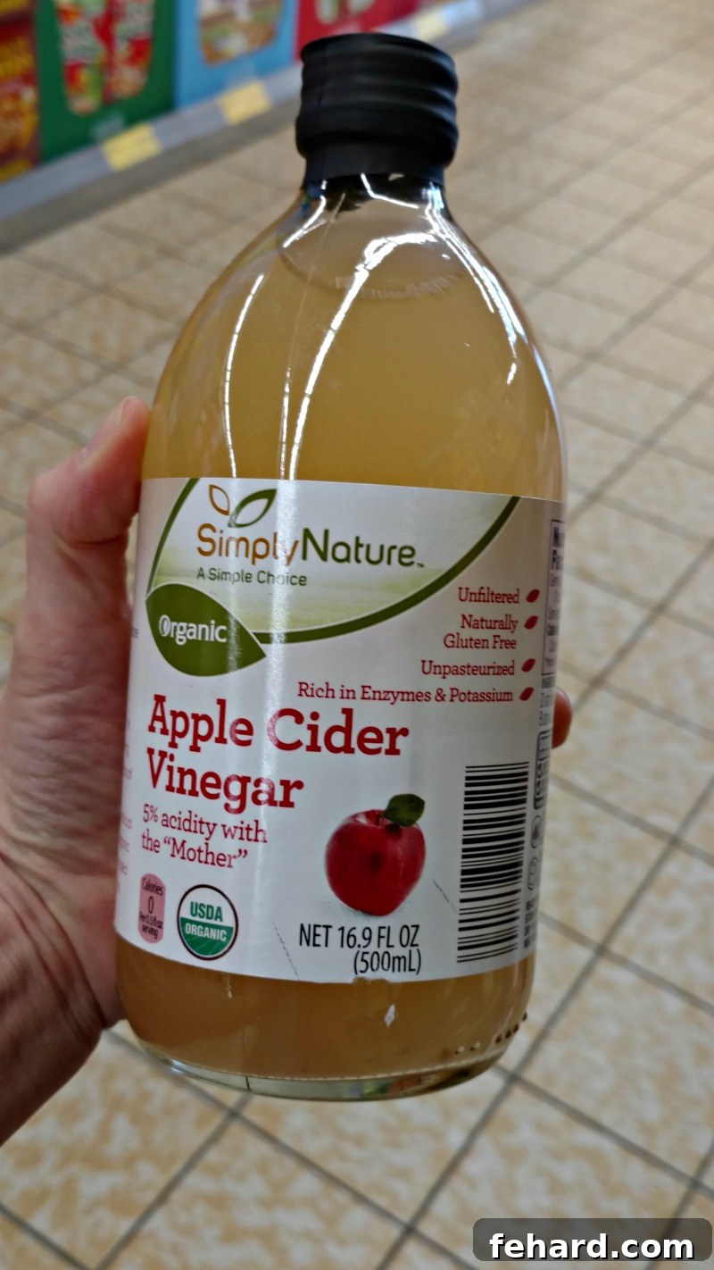 Aldi 10 Best Buys 6 Jar of Apple Cider vinegar, emphasizing ALDI's range of organic and health-conscious pantry items.