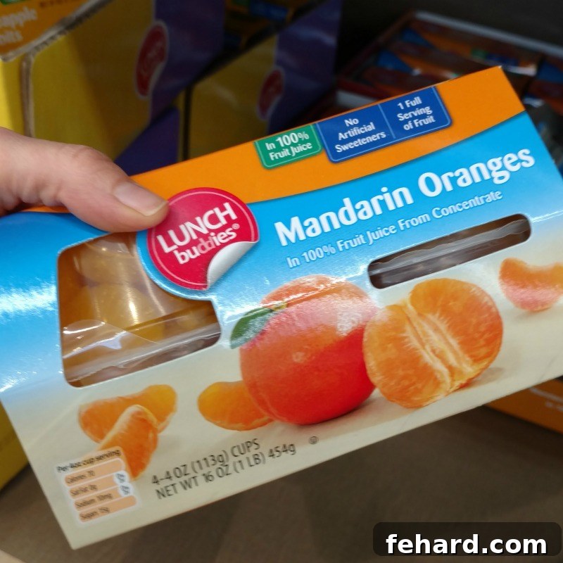 Aldi 10 Best Buys 8 Mandarin oranges in 100% fruit juice lunch snacks, showcasing a healthy and convenient ALDI lunchbox option.