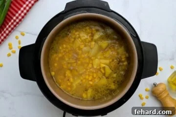 Speedy Instant Pot Potato Corn Chowder 5 Instant Pot with potato corn chowder after being pressured cooked before adding cream.