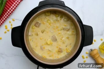 Speedy Instant Pot Potato Corn Chowder 6 Potato Corn Chowder inside pressure cooker after cream added.